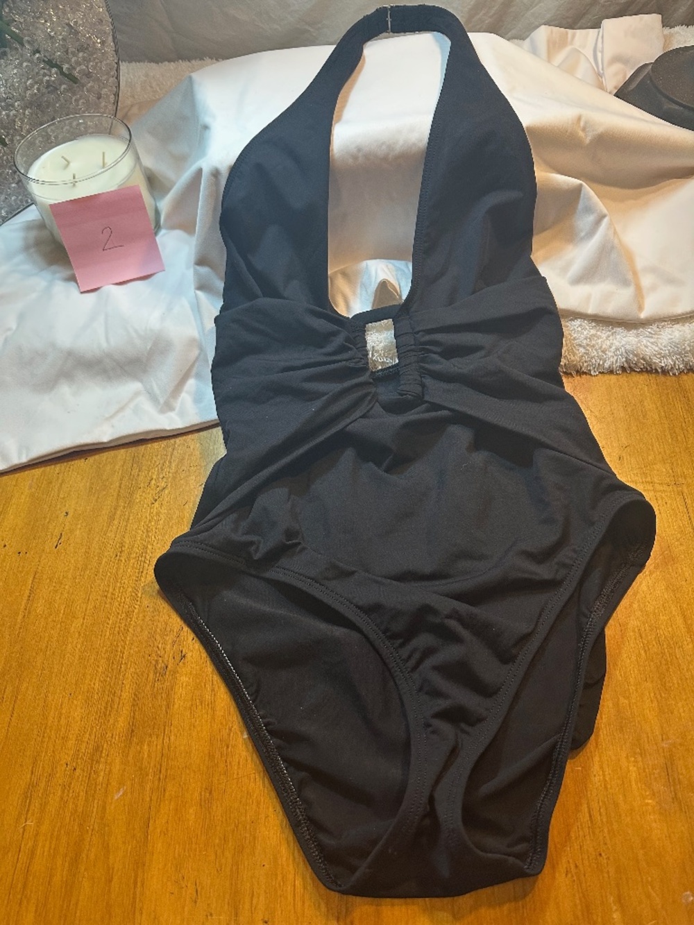 Black One Piece Swimsuit with decorative buckle at neckline